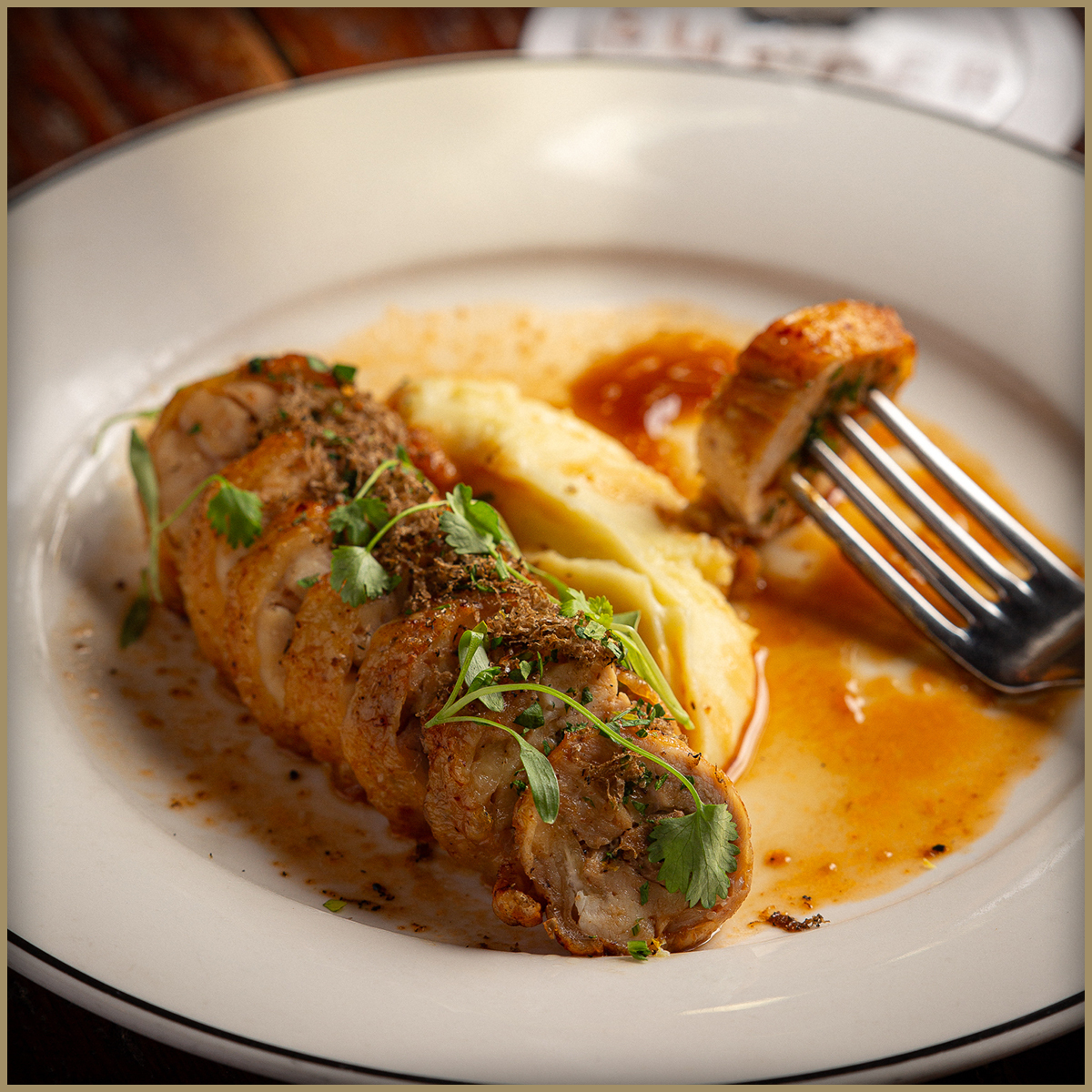 https://thehotelemma.com/wp-content/uploads/2025/04/ChickenBallotine-PressPage.jpg